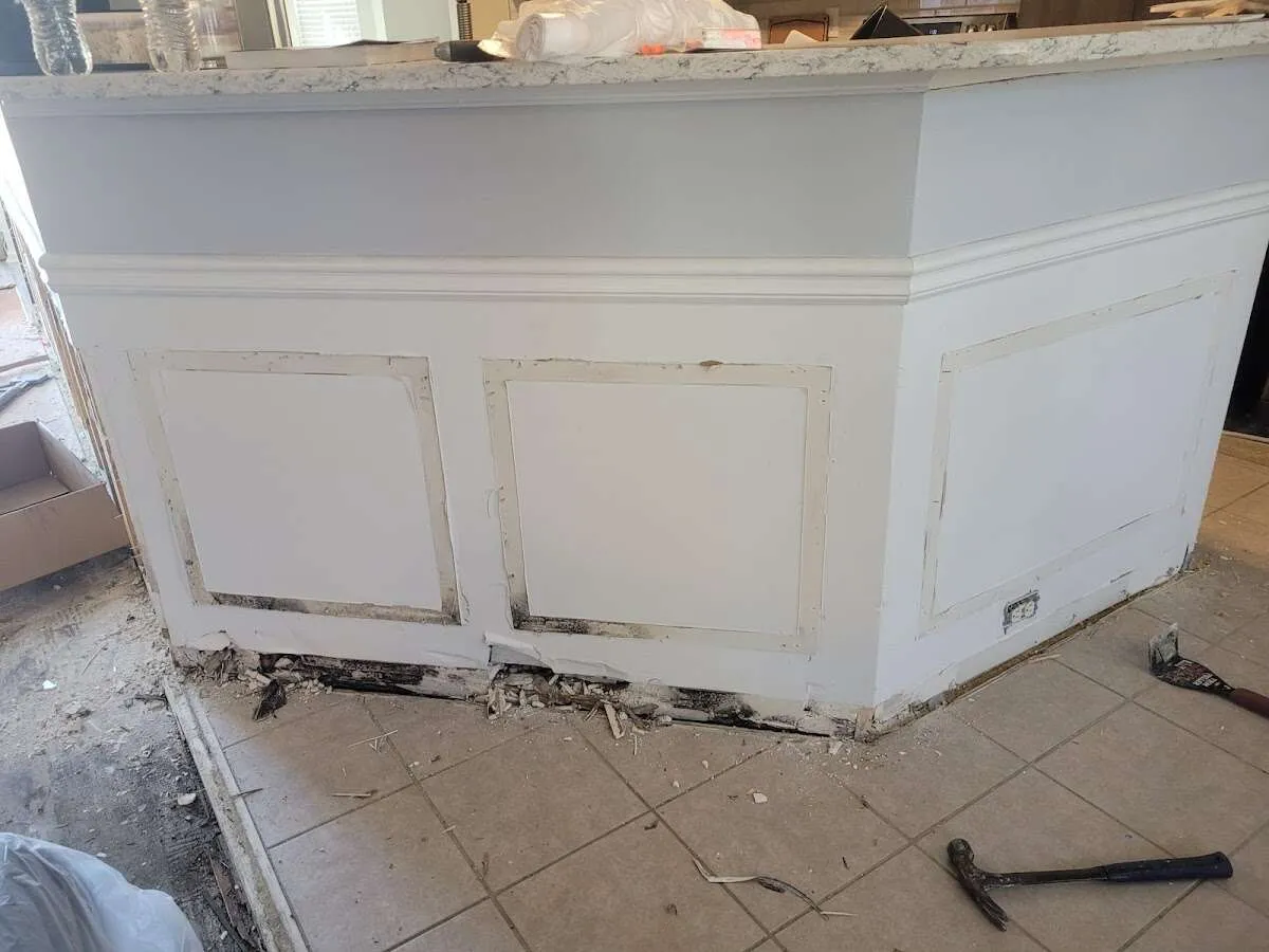 Water damage and mold on kitchen during Burst Pipe Cleanup in Ocean